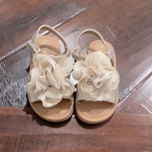 Gold sandals with big flower